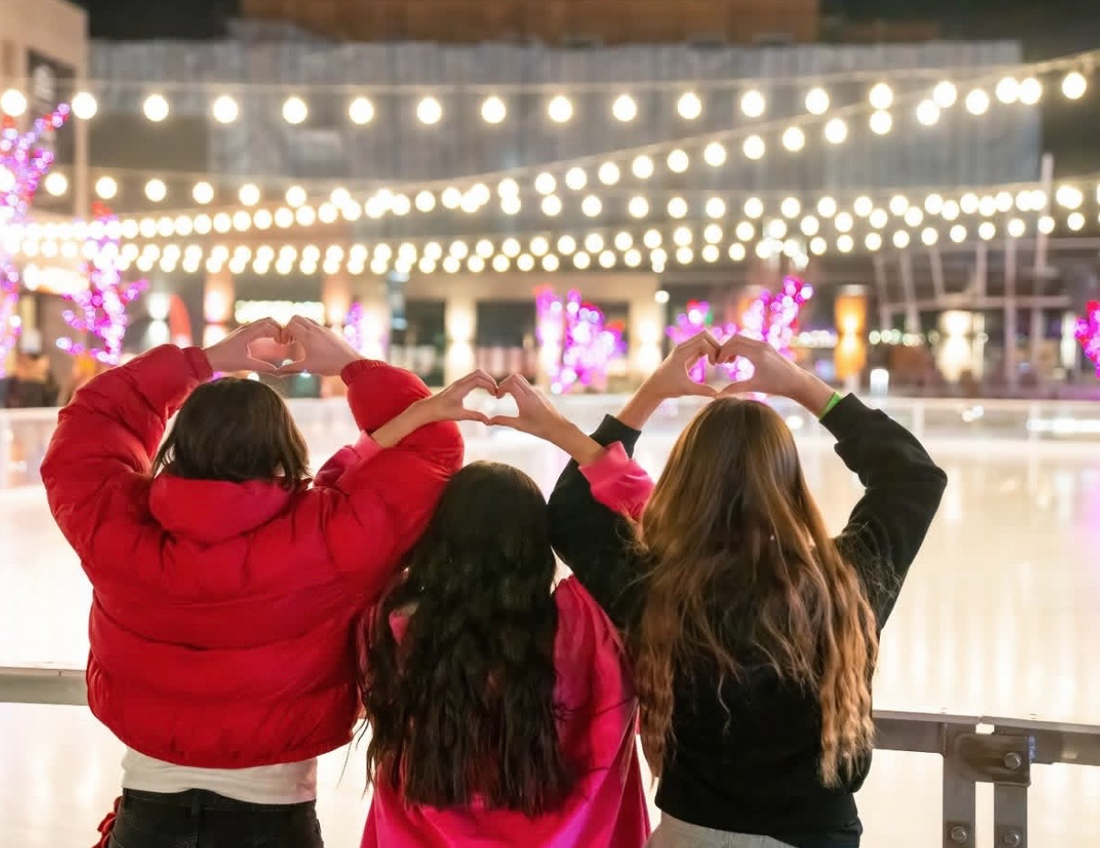 Soda Row at Daybreak — winter evening on the community ice rink under string lights